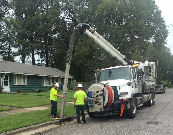 cleaning out a catch basin